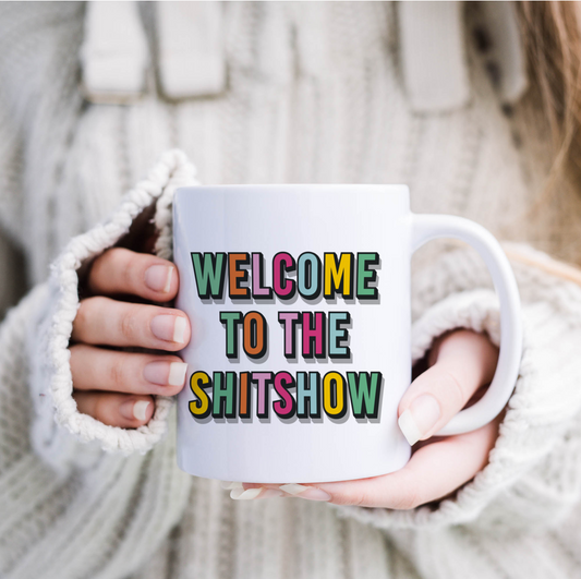 "Fun Mug - Both sides featuring 'Welcome to the Shitshow' motto, a 10oz vessel of reality and humor."