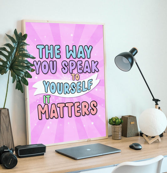 Framed Typography Print: "The way you speak to yourself, it matters." A stylish frame showcases the empowering quote, adding vibrancy to any space.