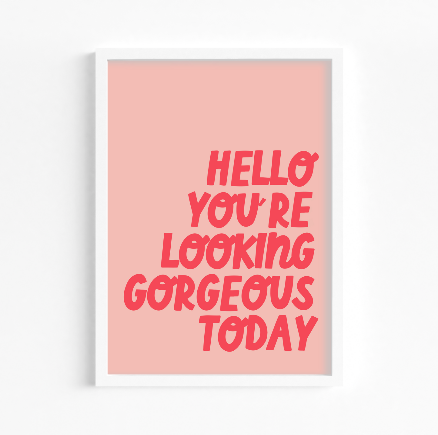 Print with quote 'hello you're looking gorgeous today' with pastel pink lettering on a light pink background