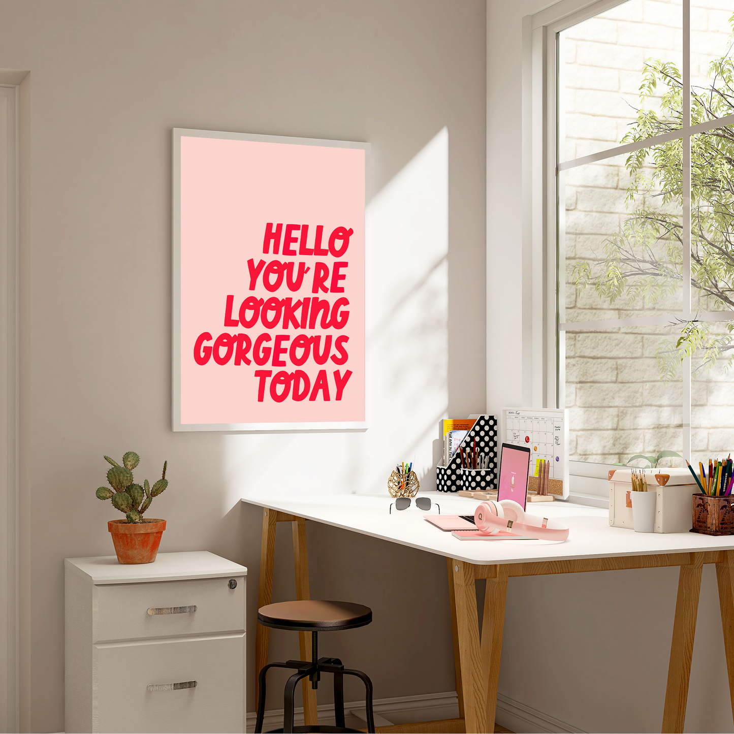 Bold Print with quote 'hello you're looking gorgeous today' with bright pink lettering on a light pink background