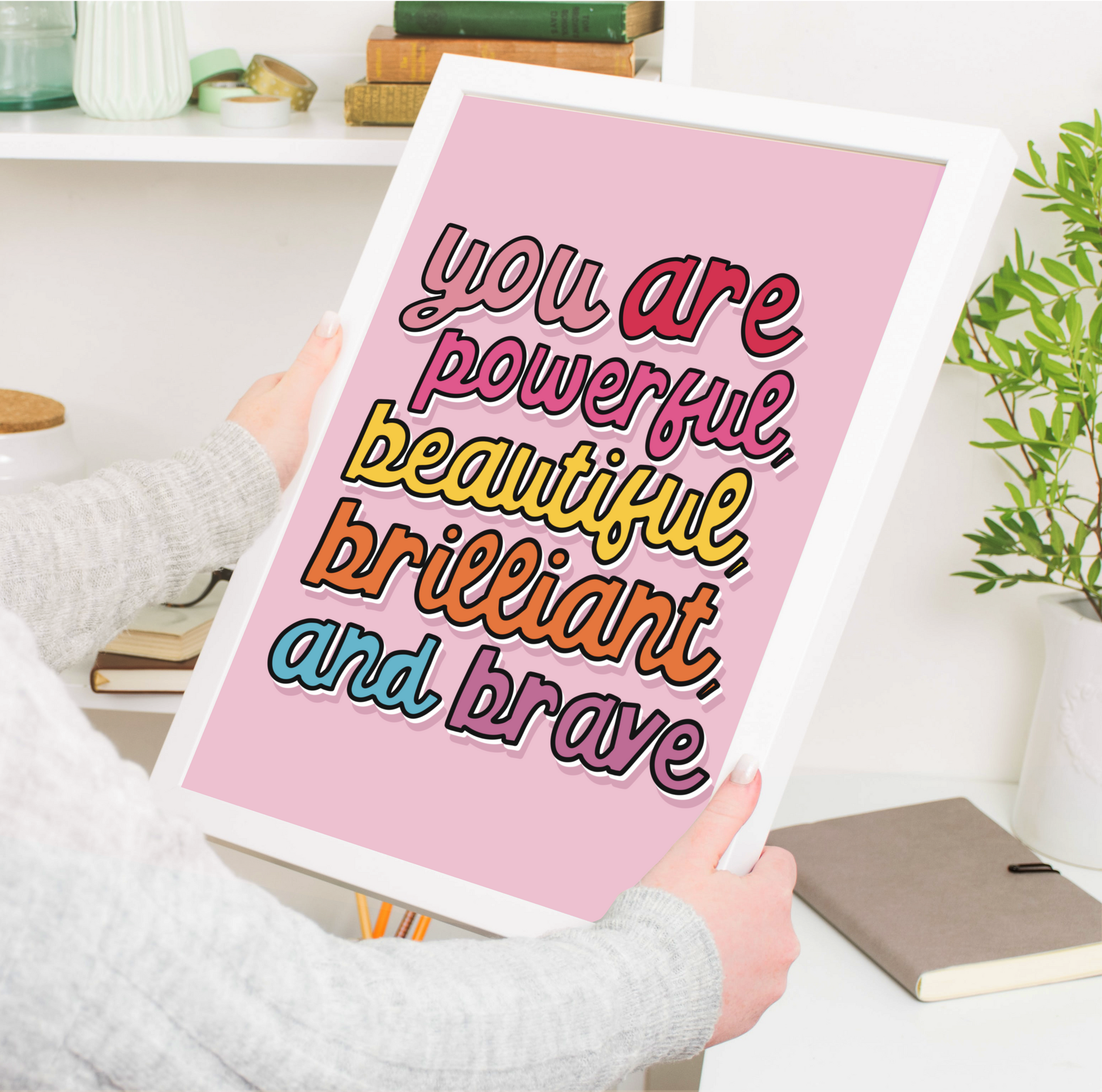 "Energizing Wall Decor - 'Powerfully Pink' Print framed in sleek black, radiating positivity. Sized from A5 to A3. Free UK delivery included."