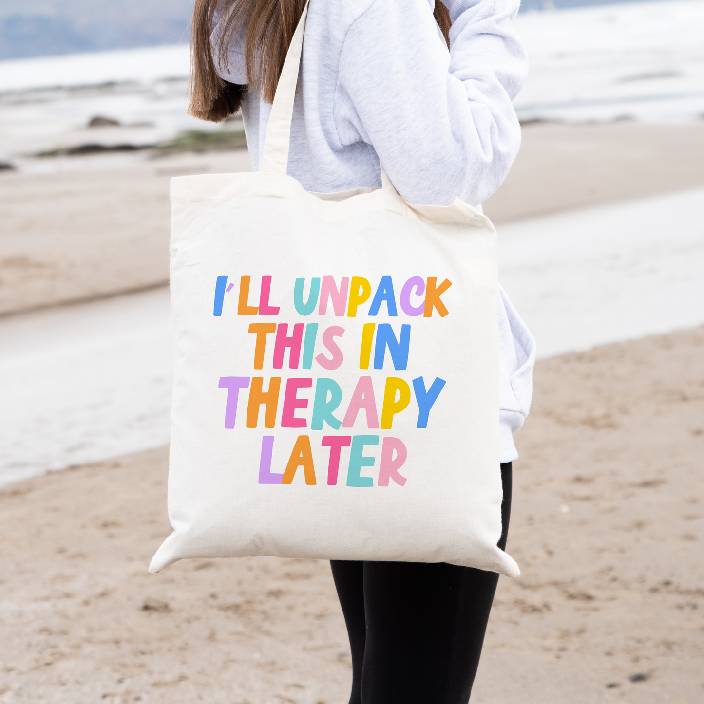 "Colorful Tote - Rainbow-hued quote on a natural cotton tote bag, measuring approximately 38x42cm."
