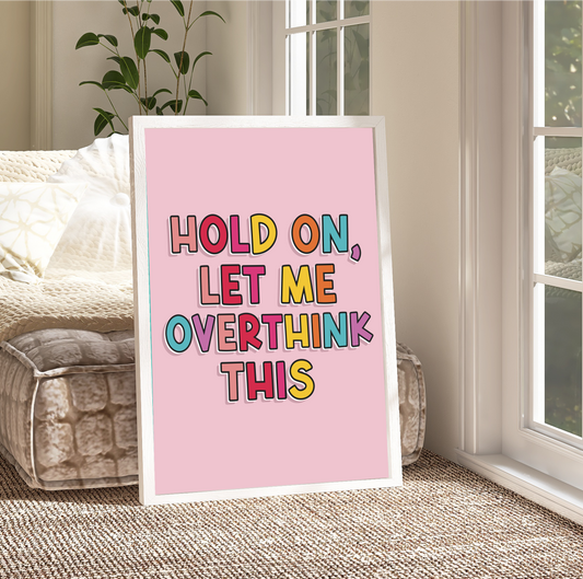  Framed 'Hold on, let me overthink this' Print: A vibrant print with a humorous quote, "Hold on, let me overthink this," framed beautifully, adding a touch of laughter to any room.