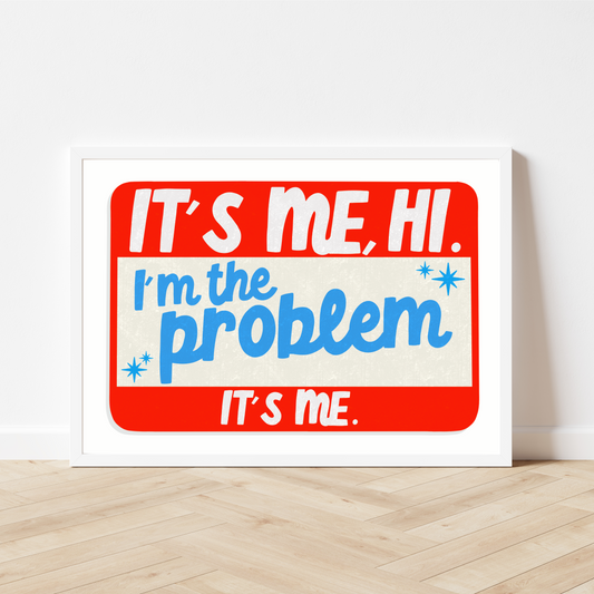 'It's Me, Hi. I'm The Problem, It's Me' Framed Print: This framed print showcases the humorous quote, perfect for adding Taylor Swift-inspired fun to your space.